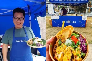 Peniaga Malaysia Street Food menyajikan hidangan nasi ayam dengan sambal dan ulam di gerai Eat Lah