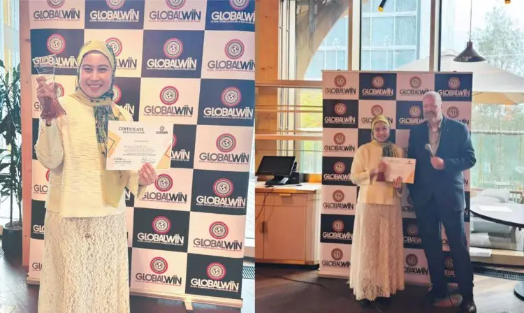 Dr Norazian Mohamed Noor menerima anugerah Double Gold di GlobalWIIN London bersama sijil dan trofi